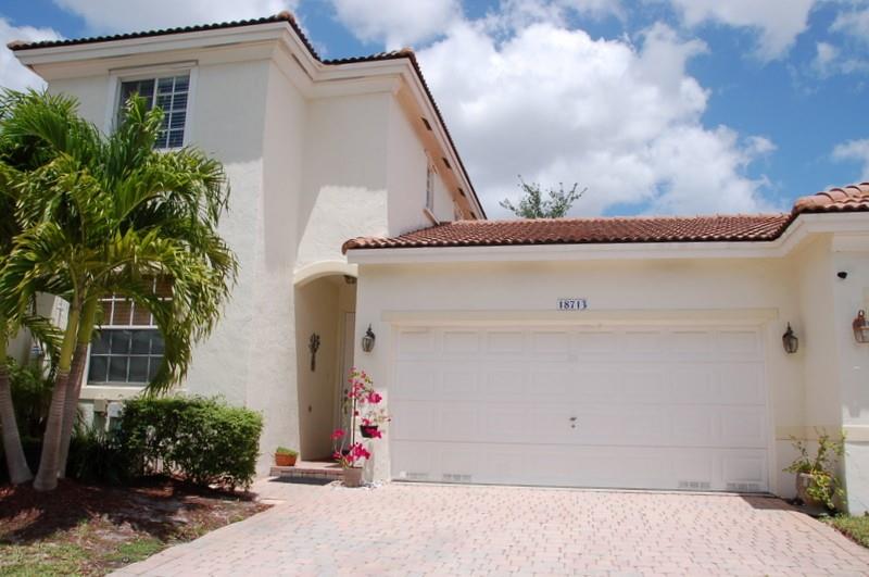 BUY THE HOUSE! Get prequalified with our preferred lender for Florida's Hometown Hero's / First Time Home Buyers program. "Up to $35K in zero percent interest". PRICED TO SELL - SELLER IS MOTIVATED! Highly sought after gated community of Grand Key at Sunset Lakes. 3 bedroom and 3 full baths with a 2 car garage. One bedroom and full bath downstairs and primary suite and an ensuite upstairs. Investor friendly (minimum 6 month and not more than 2 leases per year). Enjoy the Grand Key community pool and tot lot and you also have access to the resort style amenities of Sunset Lakes with a lakefront picnic area, swimming pool, children's pool, fully equipped gym, tennis, basketball courts, volleyball courts, the list goes on! Minutes from desirable public schools and charter schools.