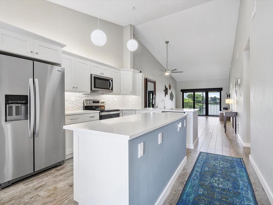 Beautifully renovated top-floor condo with serene lake views in the secluded community of Mira Lago, just south of Commercial Blvd. Centrally located with easy highway access while still offering a quiet, tucked-away setting. Features include hurricane impact windows facing the lake, electric blinds in living room and bedroom, a spacious walk-in shower with rain head, and a custom walk-in closet. The open-concept kitchen and living area showcase quality finishes and craftsmanship throughout. Major community upgrades have been completed, including new roof, painting and concrete restoration is in progress.