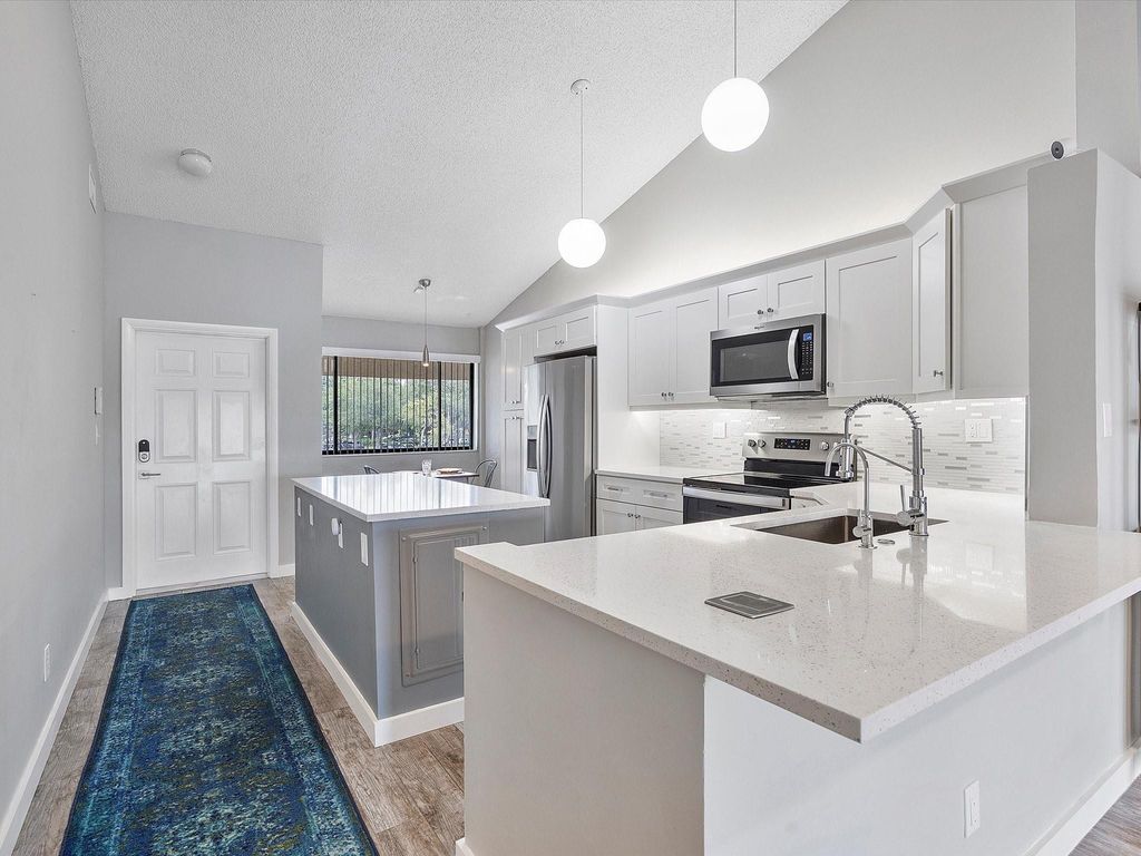 Photo of 3200 NW 46th Street #203, Oakland Park, FL 33309 (MLS # B26015307)