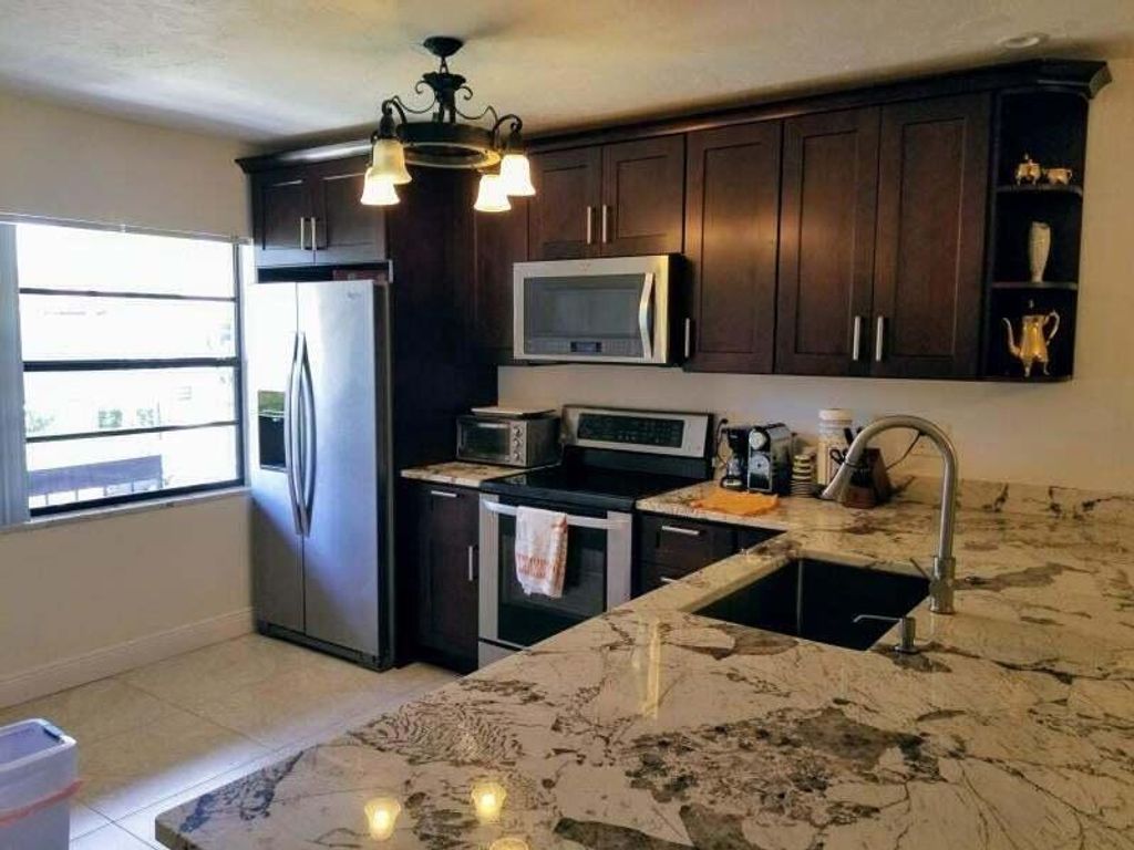 Photo of 21365 Cypress Hammock Drive #20f, Boca Raton, FL 33428 (MLS # R11077807)