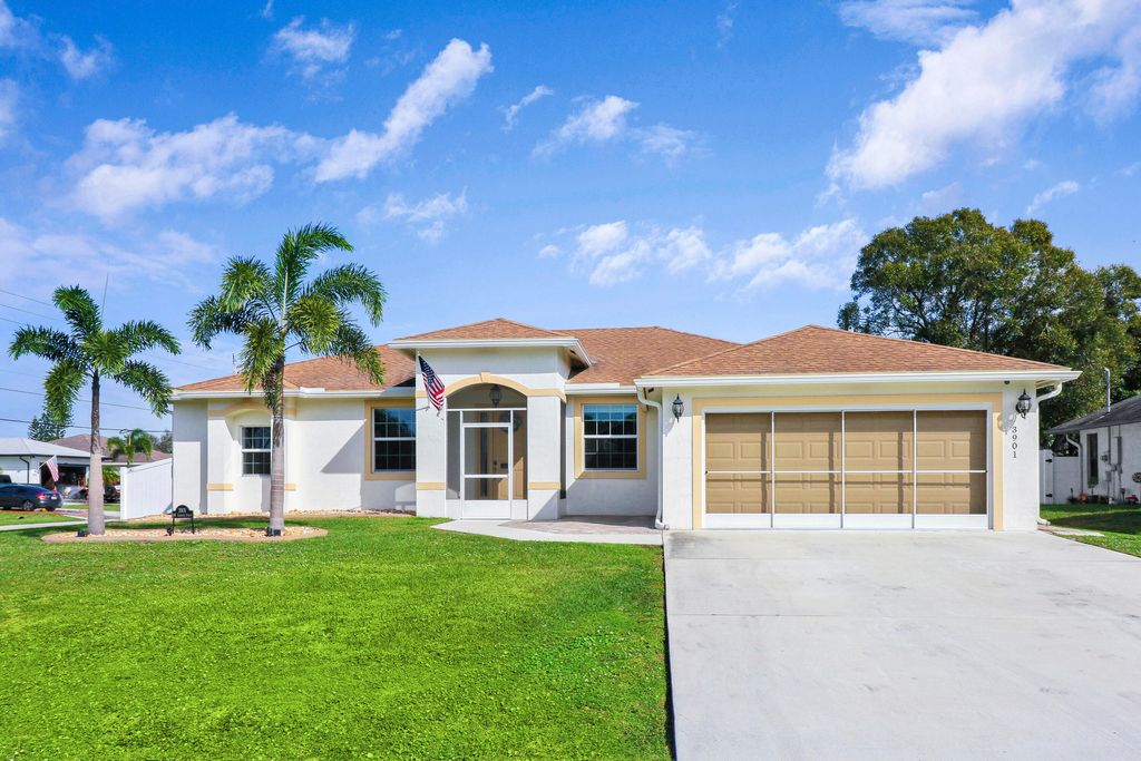Photo of 3901 SW Laffite Street, Port Saint Lucie, FL 34953 (MLS # R10951556)