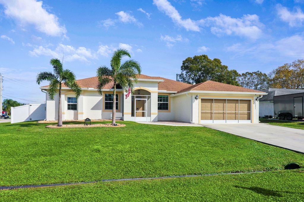 Photo of 3901 SW Laffite Street, Port Saint Lucie, FL 34953 (MLS # R10951556)