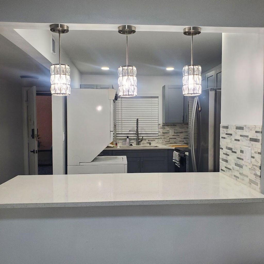 Photo of 2001 W Woolbright Road #F101, Boynton Beach, FL 33426 (MLS # R11028104)