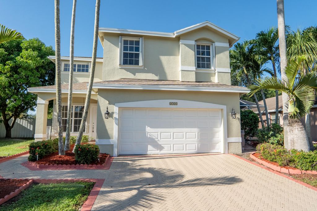 Photo of 1722 Sawgrass Circle, Greenacres, FL 33413 (MLS # R11126227)