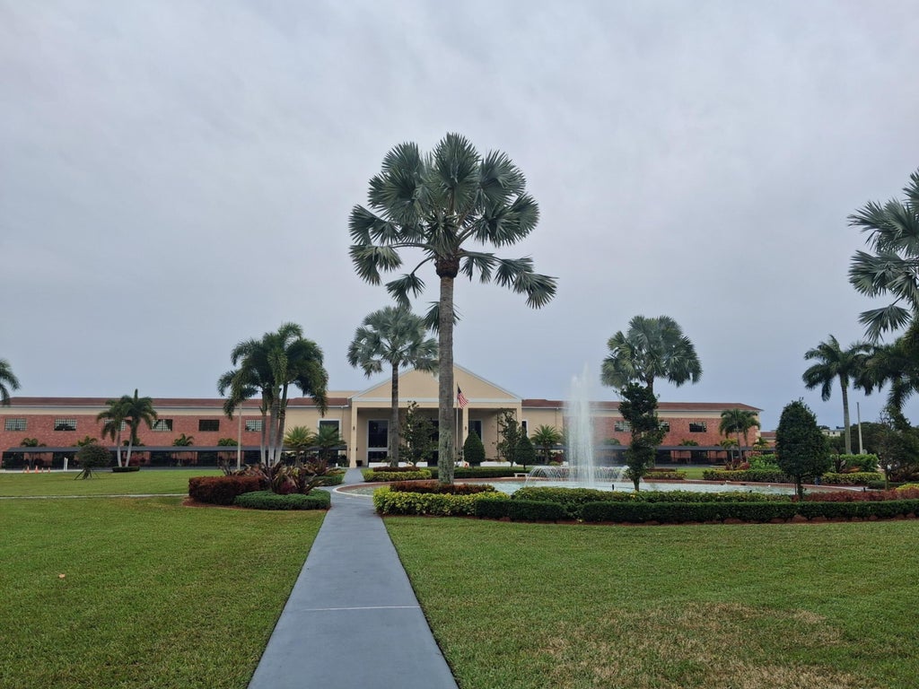 Photo of 9851 E Sandalfoot Boulevard #219, Boca Raton, FL 33428 (MLS # B26046522)