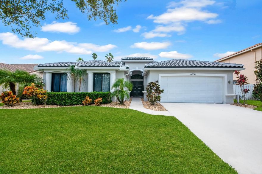 Welcome to a masterfully reimagined residence in the prestigious Winston Trails community -- a sanctuary of contemporary luxury and effortless South Florida living. Perfectly positioned along the golf course, this exquisite home blends refined design with resort-inspired outdoor living, highlighted by a heated pool with brand-new white marble resurfacing, a cascading waterfall spa, and lush tropical privacy. From the moment you pass through the grand double entry doors, you're greeted by soaring ceilings, natural light, and a serene sense of sophistication. Every inch of this home has been meticulously updated -- featuring a new roof, impact-rated windows and doors, a new garage door, and a state-of-the-art whole-house water filtration system -- offering both beauty and peace of mind.