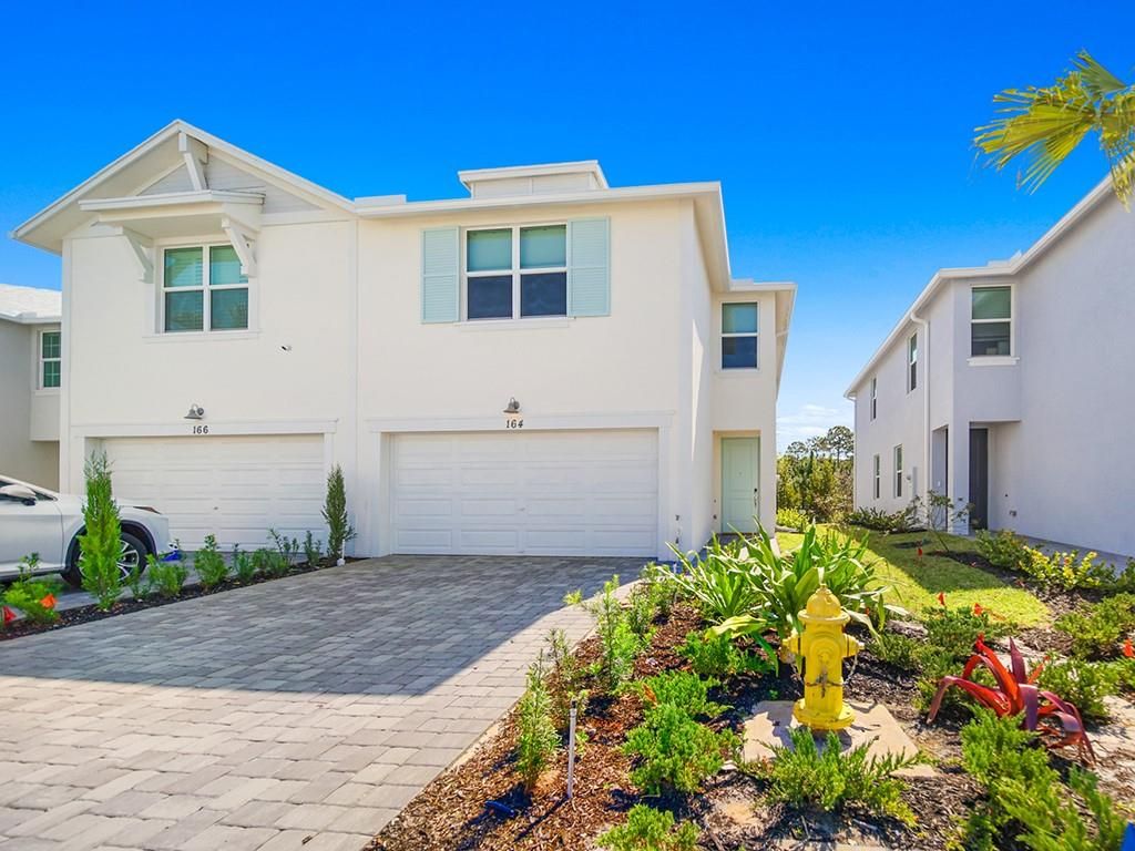 Photo of 164 Osprey Preserve Blvd, Jensen Beach, FL 34957 (MLS # F10376550)