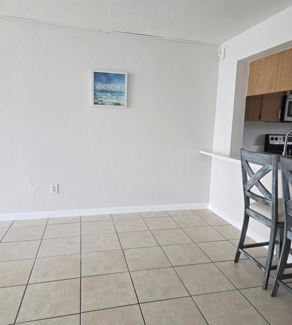 Photo of 1503 Palm Beach Trace Drive, Royal Palm Beach, FL 33411 (MLS # B26045610)