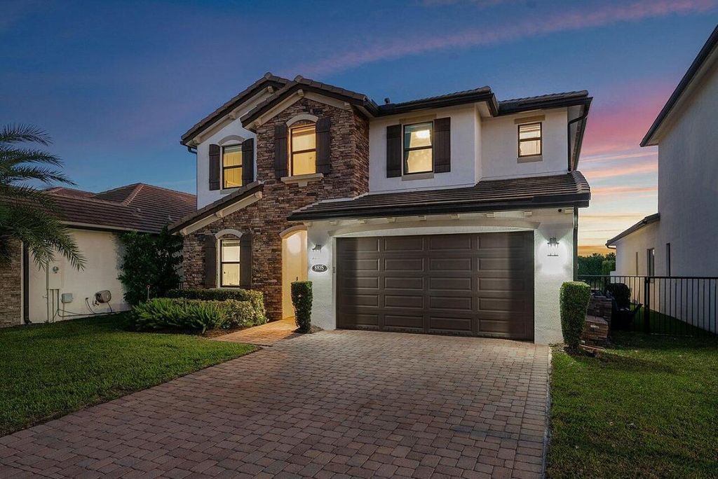 Photo of 8835 Grand Prix Lane, Boynton Beach, FL 33472 (MLS # R11142149)