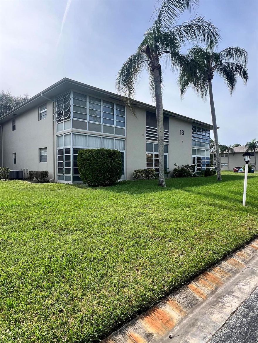 Welcome to your peaceful retreat in this sunny South Florida 55+ community! This charming 1-bedroom, 1.5-bathroom, second-floor condo offers privacy and tranquility, tucked toward the back of the community. The bedroom is oversized and includes a 14 foot, double door closet! Step into the spacious, beautifully enclosed patio offering a seamless blend of indoor and outdoor living. The corner balcony is perfect for your morning coffee or afternoon relaxation with convenient washer/dryer hookups thoughtfully located in the storage area attached. Shared laundry also available on the 2nd floor and a short walk away. Inside, you'll find a newly installed kitchen faucet, brand new water heater and a layout that flows easily from one room to the next, making daily living a breeze.