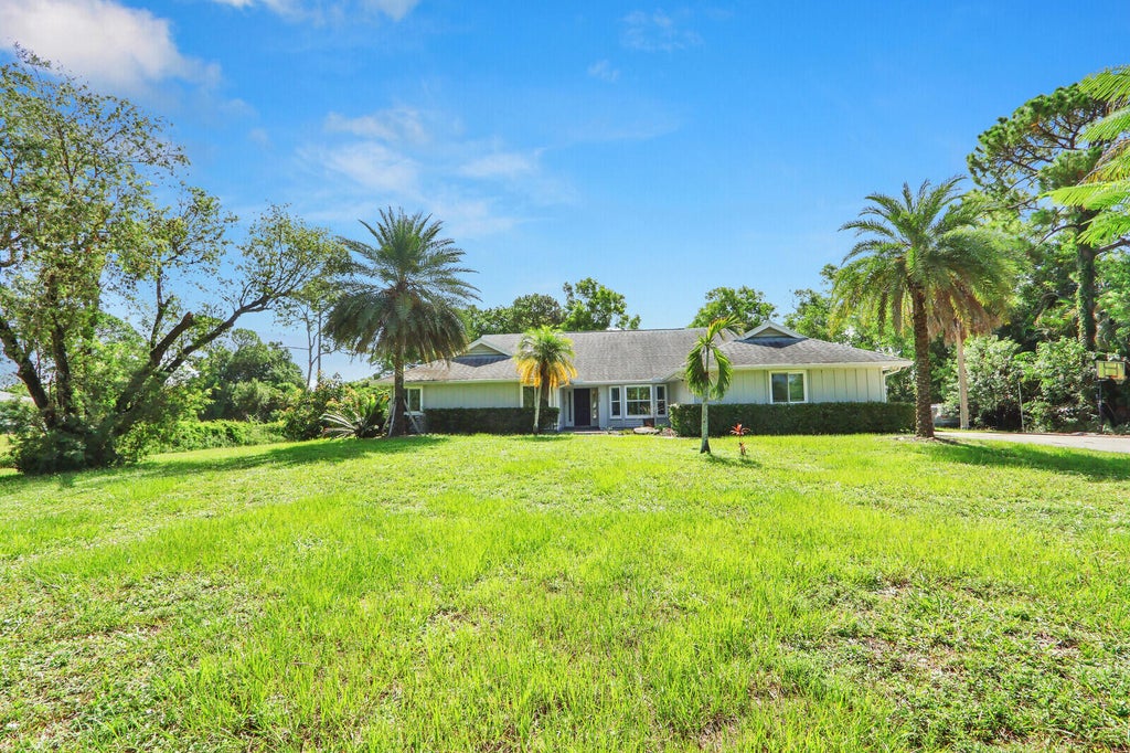 Photo of 4120 130th Avenue N, West Palm Beach, FL 33411 (MLS # B26048588)