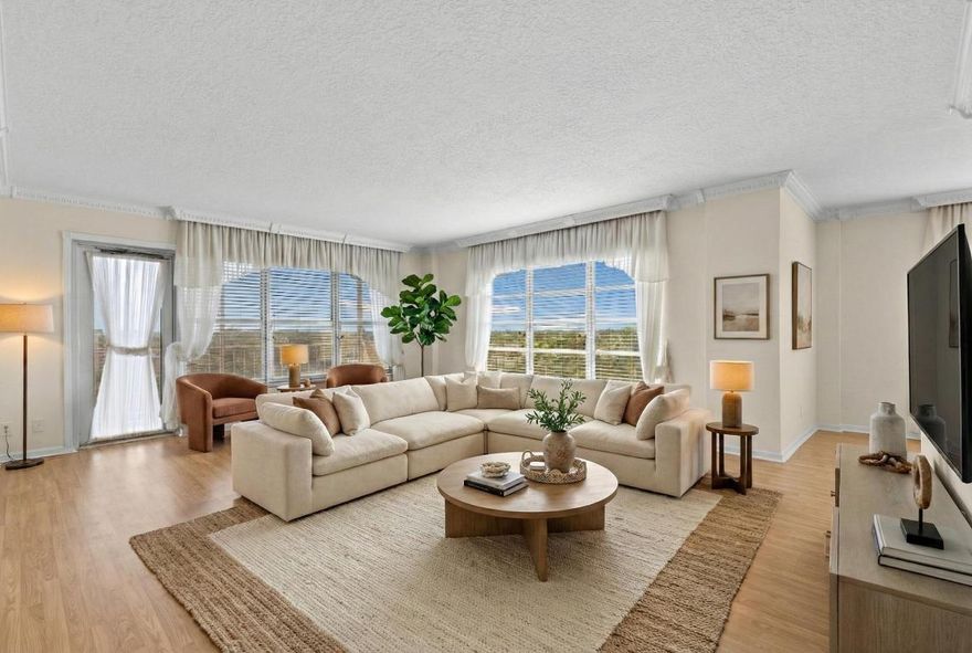 Your next home is here—a spacious corner 2/2 with beautiful natural light, crown molding, and a balcony perfect for sunrise coffee. The master has a large walk-in closet, and the 2nd bedroom comes with a Murphy bed for extra flexibility. Located in a secure 55+ Coral Springs community with 24/7 security, pool, gym, library, laundry on every floor & more. Water, cable & internet included!