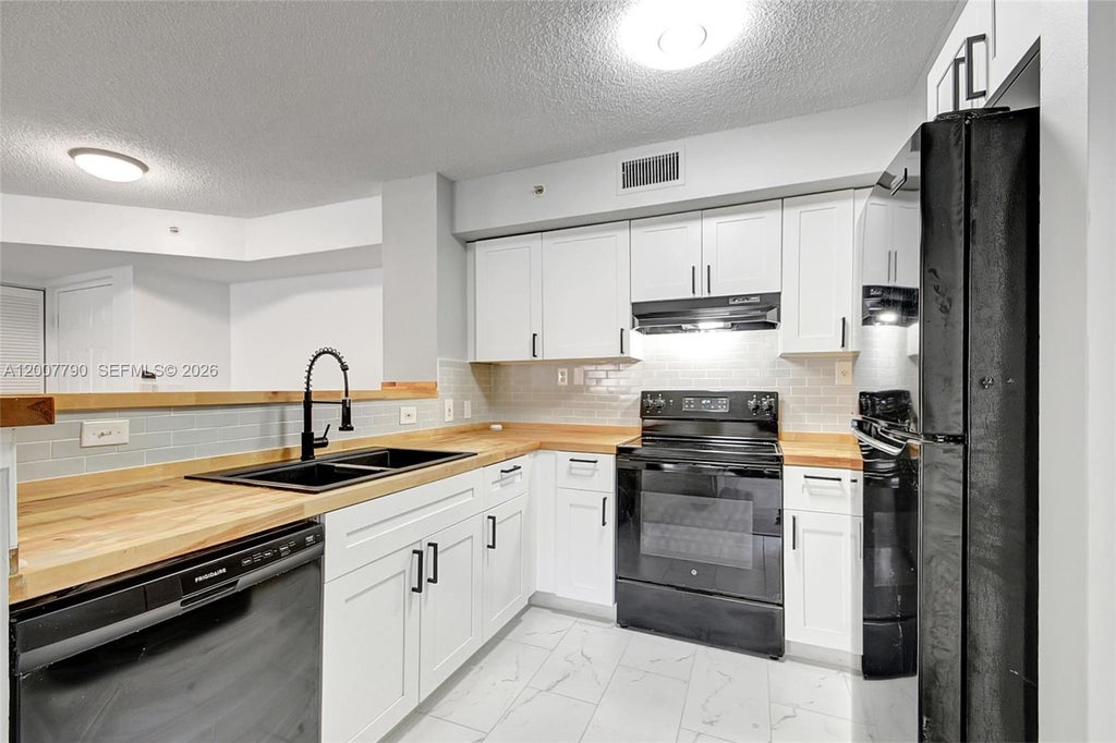 Photo of 7808 Sonoma Springs Circle #204, Lake Worth, FL 33463 (MLS # A12007790)