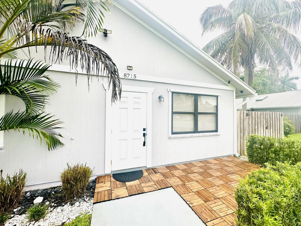 Photo of 8715 SOL Terrace, West Palm Beach, FL 33403 (MLS # B26073373)