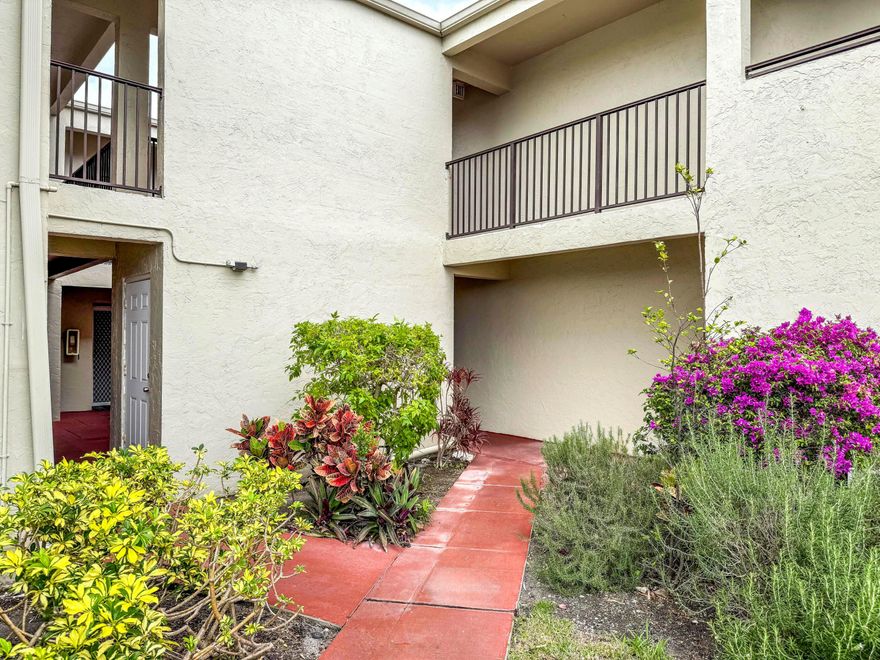 Bright, freshly updated, and move-in ready — this 1BR/1.5BA condo in the desirable 55+ community of Boundbrook offers easy, low-maintenance living in a prime location. The open living & dining area creates a comfortable great room feel, perfect for entertaining, with direct access to a spacious covered patio featuring oversized windows that fill the space with natural Florida sunshine. The kitchen is clean and functional with white wood cabinetry, neutral countertops, and tile flooring. Both bedrooms are light and airy with fresh paint and neutral tile throughout, while the well-designed layout offers abundant storage plus the convenience of an in-unit washer and dryer. Boundbrook is a welcoming, well-located community just minutes from CityPlace, the Kravis Center, fine dining, shopping,  and easy access to I-95. A fantastic opportunity to enjoy comfortable living in the heart of West Palm Beach — don't miss it!