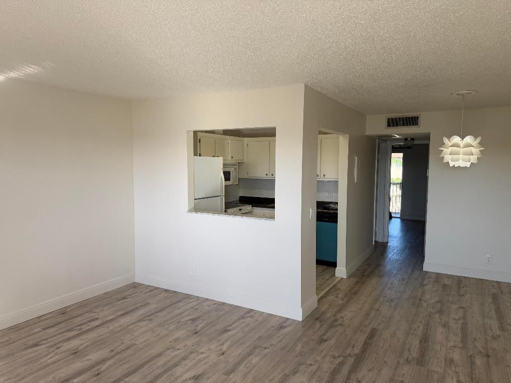 Photo of 400 Village Green Circle W #304, Palm Springs, FL 33461 (MLS # R11155866)