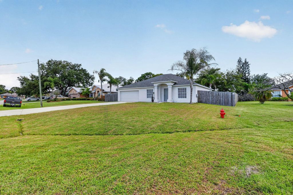 Photo of 6115 NW Nolia Court, Port Saint Lucie, FL 34983 (MLS # B26045295)