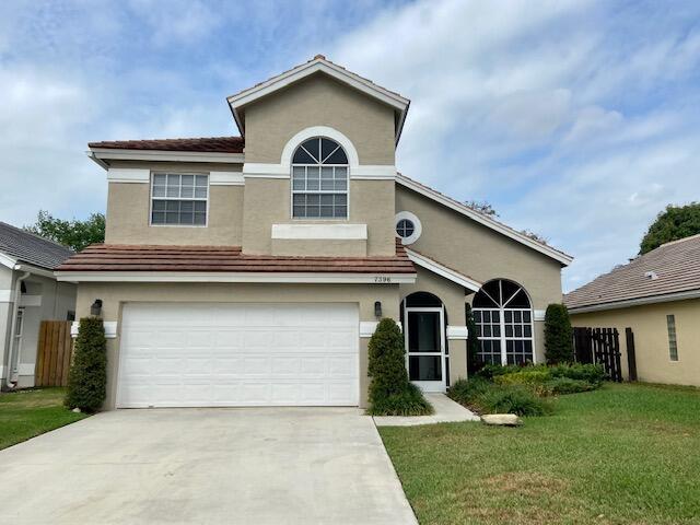 Located in the triple A rates school district of Palm Beach this fully furnished 4 bedroom, 2.5 bath home with 2 car garage is located in the gorgeous community of Lake Charleston. Tastefully renovated and furnished. Fenced in backyard and screened in patio. Annual rental. Small Pets will be considered.