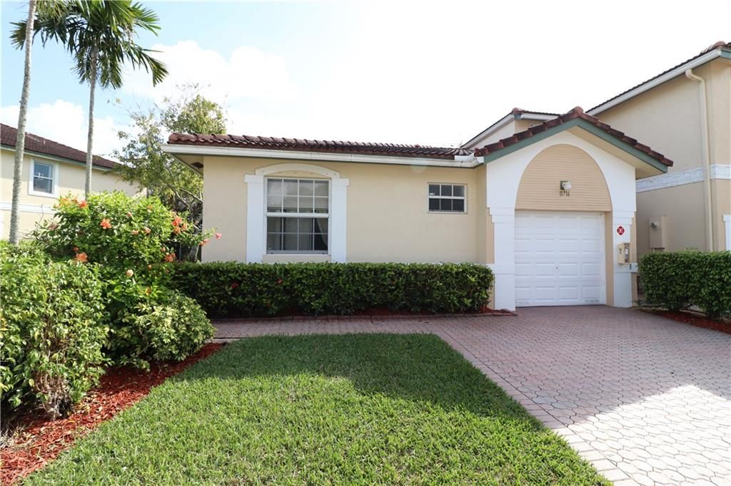 Photo of 11716 NW 47th Dr #11716, Coral Springs, FL 33076 (MLS # F10311689)