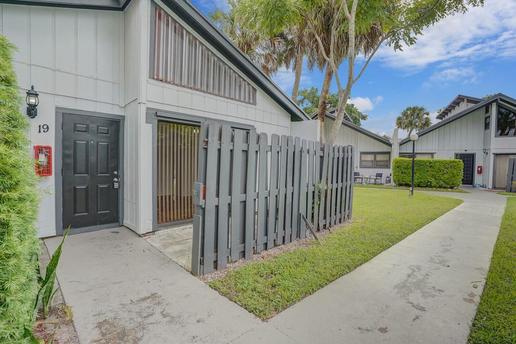 Photo of 100 Sparrow Drive #19, Royal Palm Beach, FL 33411 (MLS # R11119333)