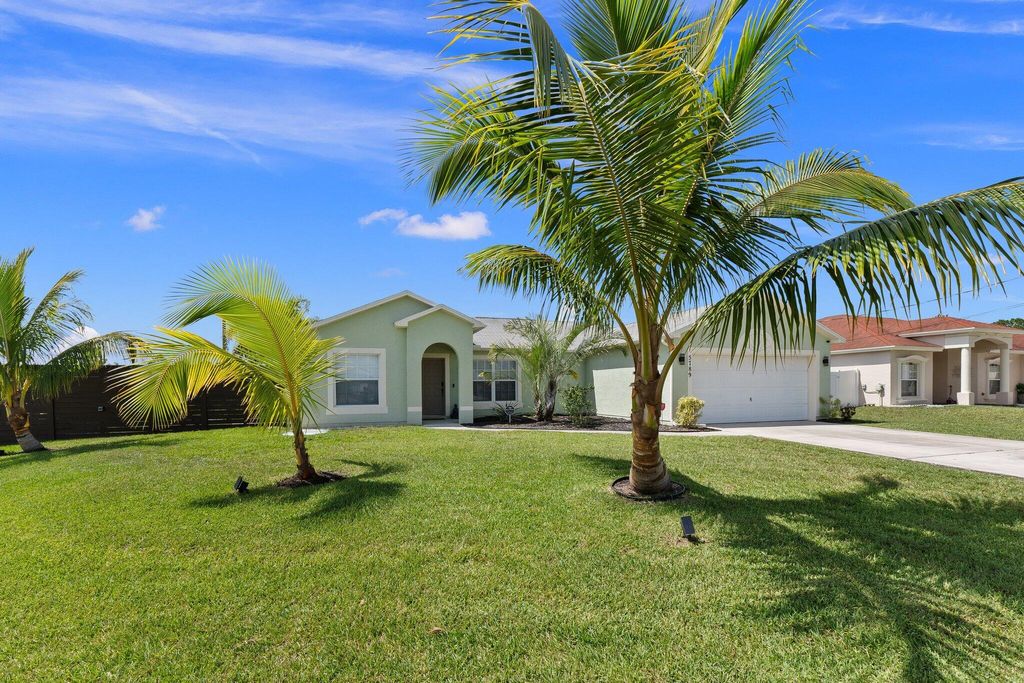 Photo of 5789 NW Belwood Circle, Port Saint Lucie, FL 34986 (MLS # R11035165)