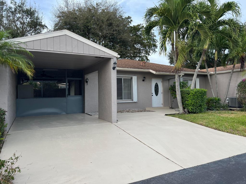 Photo of 14704 Wildflower Lane, Delray Beach, FL 33446 (MLS # R11160665)