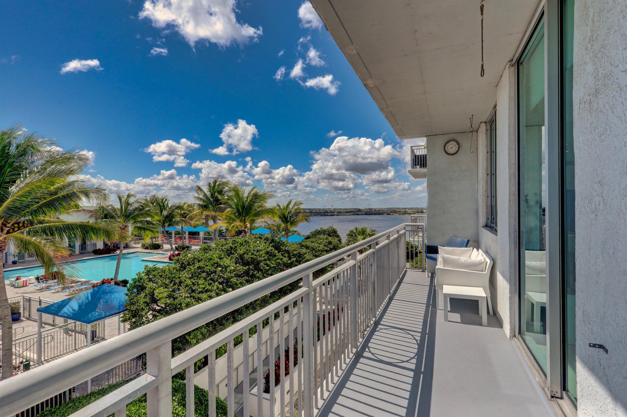 Modern, bright, and beautiful 2/2 corner unit with wrap around balcony available for annual lease. This 8th floor 1,178 sf unit features marble floors, exposed concrete, and high 10' ceilings with a split floor plan. Fully furnished and ready for you to enjoy the resort lifestyle at the Edge. Balcony overlooks the huge pool area and brings in lots of natural light. The view is even more dynamic now with the first class Luminaire pool deck next door. Assigned garage parking space included. The Edge is a popular building close to eclectic dining and shopping in Cityplace. Perfectly located 10 minutes from PBI Airport or the beach. You will love living here!