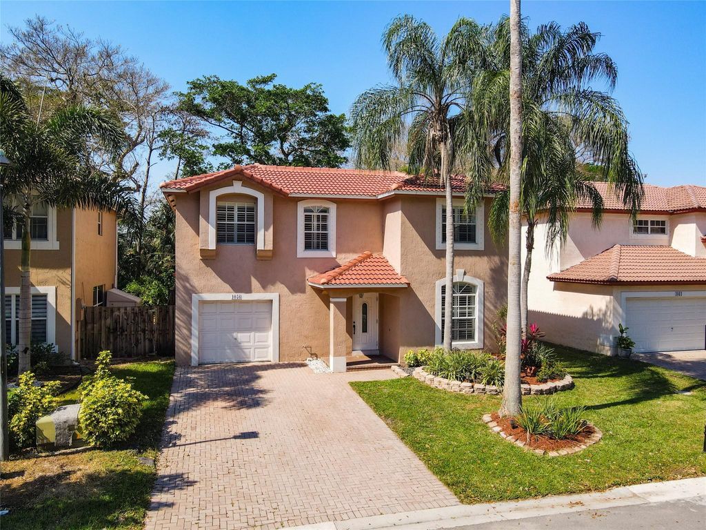 Photo of 4056 NW 62nd Lane, Coral Springs, FL 33067 (MLS # F10509834)