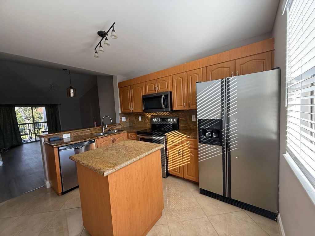 Photo of 5781 Riverside Drive #201, Coral Springs, FL 33067 (MLS # F10538743)