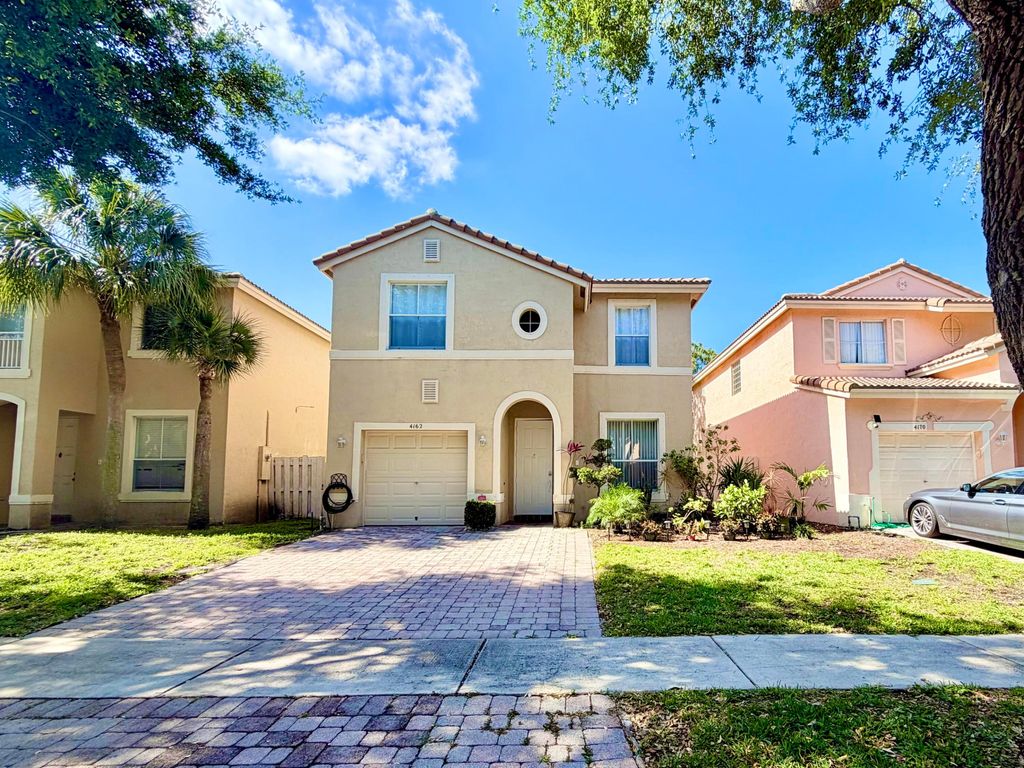 Photo of 4162 Winnipeg Way, West Palm Beach, FL 33409 (MLS # B26020763)