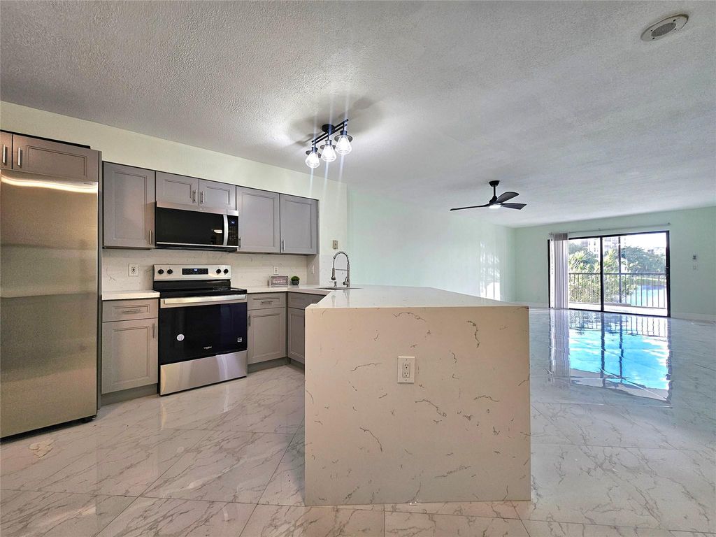 Photo of 2232 N Cypress Bend Drive #208, Pompano Beach, FL 33069 (MLS # F10519430)