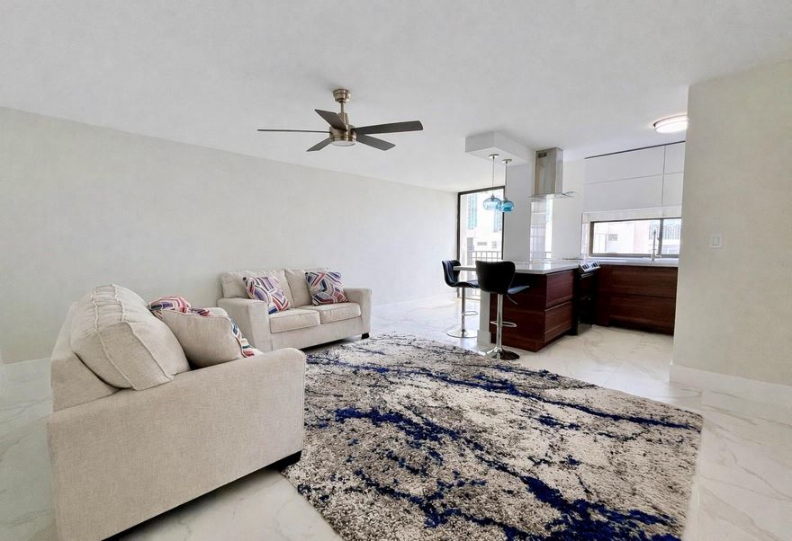 LOCATION, WALKABILITY & TURNKEY CONDITION. Fully renovated 2/2 residence in a gated, all-ages community just steps from the ocean, shops, and daily conveniences—no car needed. Unit completely updated from top to bottom with new tile flooring, kitchen, appliances, bathrooms, doors, fans, and finishes throughout. Bright, open layout with abundant natural light. The building has also undergone renovations and is well maintained. Rental allowed immediately, making it ideal for end-users or investors. Enjoy resort-style amenities: a heated pool, jacuzzi, brand-new gym & sauna, 2 tennis courts, basketball, BBQ area, library, 24/7 security. Up to 3 parking spaces. Prime location near Aventura Mall, Bal Harbour, dining, parks, A+ schools, and beaches. Perfect for living, vacationing, or renting.