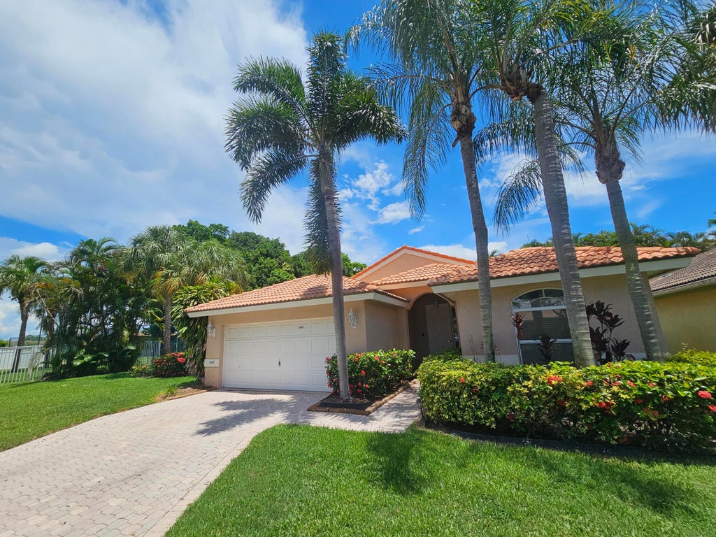 Photo of 5449 Grande Palm Circle, Delray Beach, FL 33484 (MLS # B26057265)