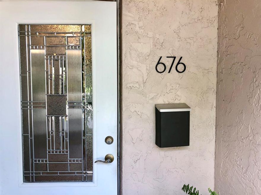 Completely Renovated Townhome in Wilton Manors, walking distance to Wilton Drive. Sought after Townhouse Isle with no thru traffic. Renovation in 2007 with hurricane windows, electrical panel, knockdown walls and ceilings, all bathrooms with granite. Kitchen has Silestone countertops, stainless steel appliances. Living room has working fireplace, outdoor private screened in patio access to swimming pool located on South fork of Middle River. A/C is 2018 Trane compressor and handler, Roof is 2012. Bahama shutters throughout. Tile and wood flooring. California closet in Master. Both bedrooms are large and have private bathrooms both with glass enclosures for shower and bathtub in 2nd. This is the best location in Wilton Manors, complex is located on the Middle River.