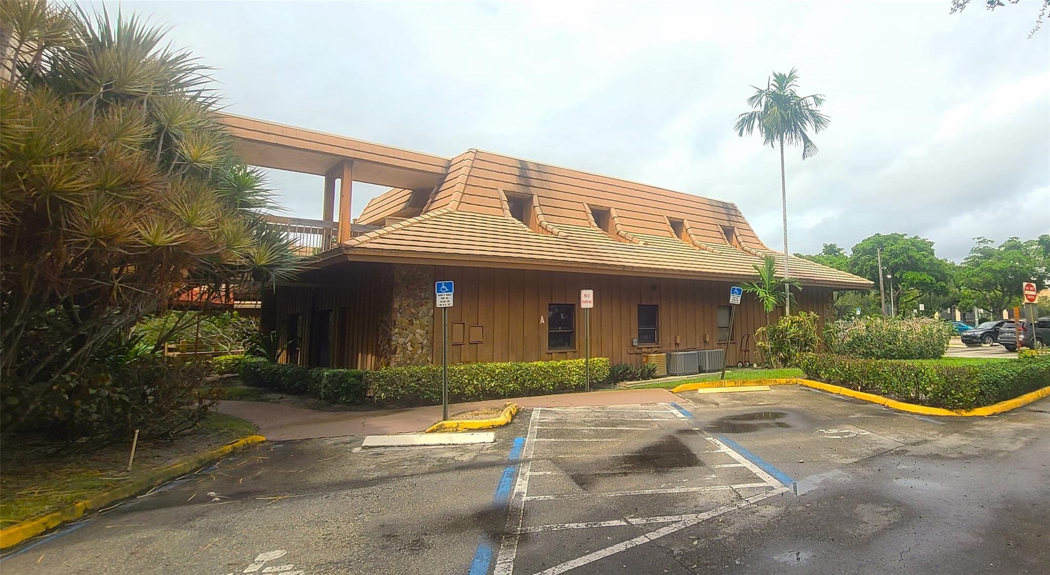 Semi-freestanding building located in tropical Belle Terre complex. Freshly painted and carpet removed for new owner’s customization. Blank canvas! Office/Medical space is 3595+/- SF. Building A is suitable for medical or professional use with frontage to Oakland Park. Unit #100 features a reception area, two offices, four exam rooms, two restrooms, and an open area. Unit #101 is a two-floor unit (with elevator access) with a reception area, six offices, a conference room, two restrooms, and an open area. Don't miss out on the opportunity to purchase this top-quality property. Seller financing with low rates may be available to qualified buyers.