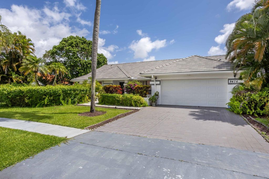 Photo of 9476 El Clair Ranch Road, Boynton Beach, FL 33437 (MLS # B26014523)