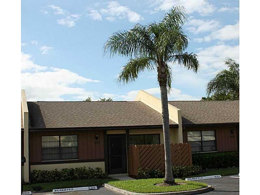 Lovely, well cared for home with a water, lakefront view that will make you never want to leave home. Brand new carpeting in living areas & bedrms. Home move in ready offering an eat-in kitchen, open air front fenced in porch, along with a back screened i n porch that overlooks the serene lake at Woodlake Isles. Community offers pool, tennis, boat ramps and the ability to add your own boat dock. In addition, a clubhouse, complete with rental options & a pool table for your entertaining needs. Dimens approx