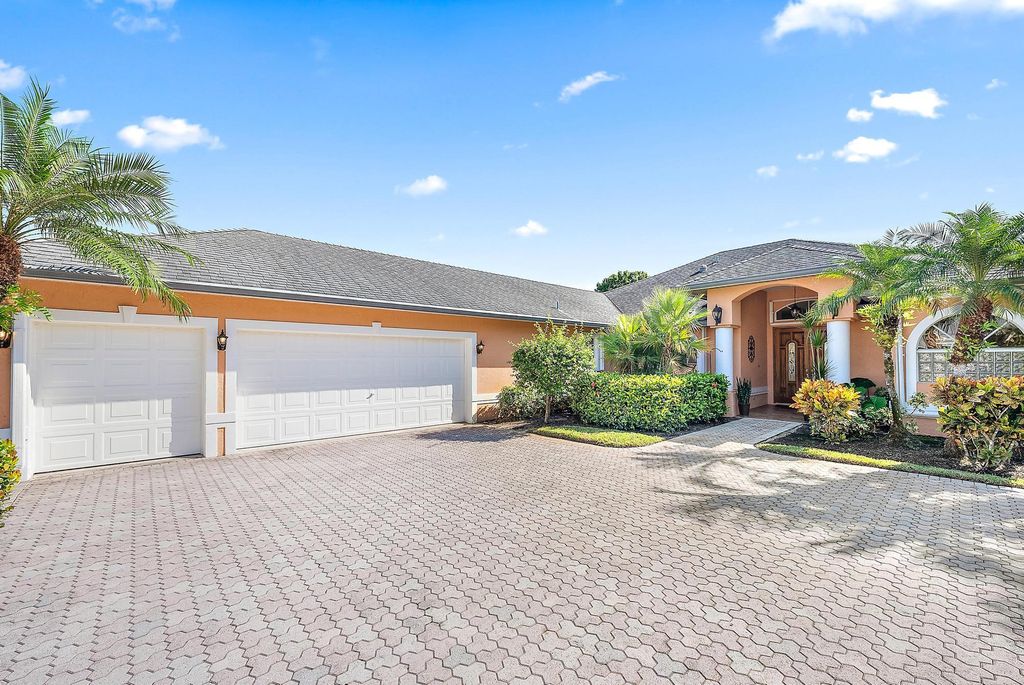 Photo of 1784 Oakwater Point, Palm City, FL 34990 (MLS # R11029835)