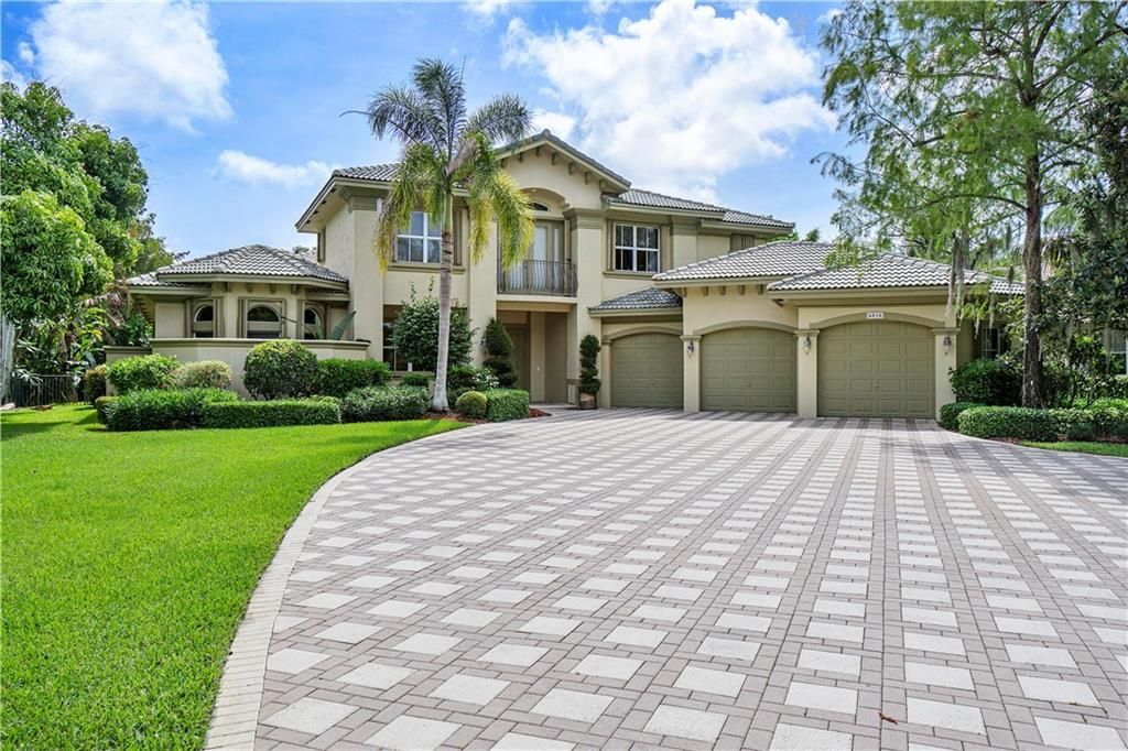 Photo of 6030 NW 91st Ave, Parkland, FL 33067 (MLS # F10286212)