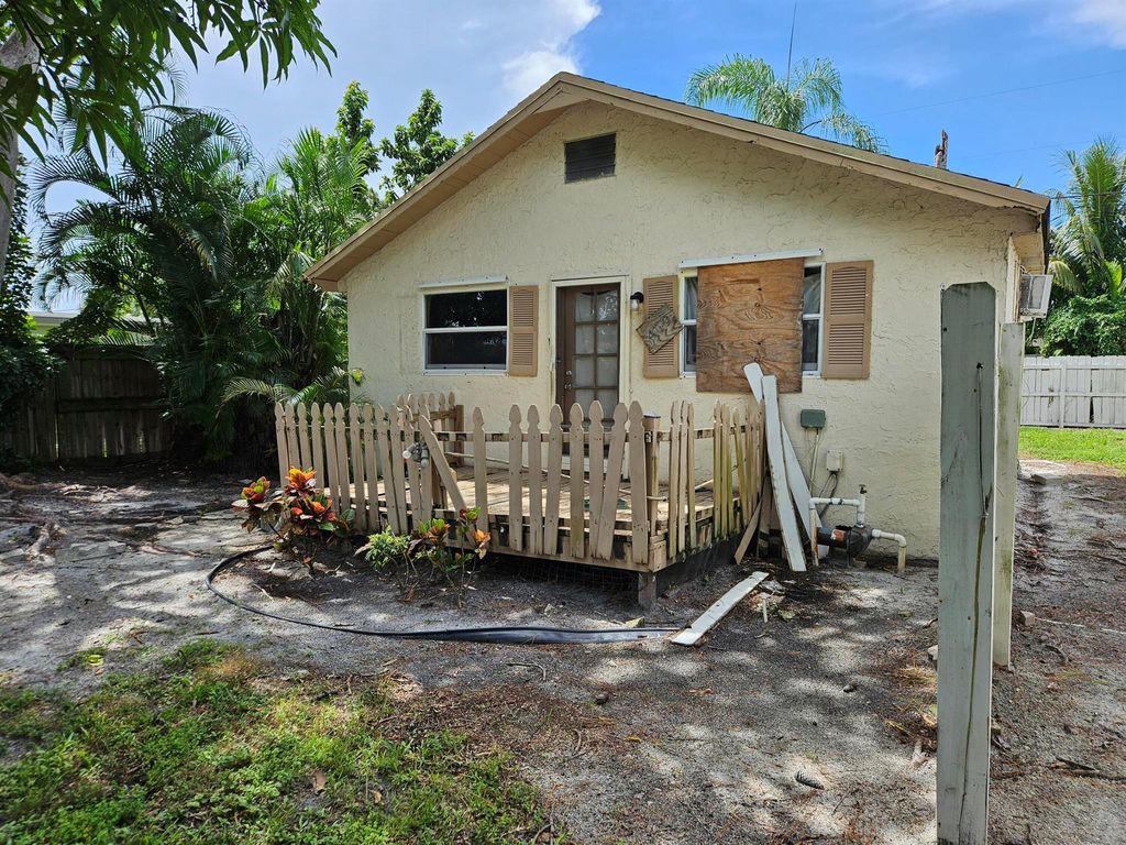 Photo of 409 Perry Avenue, Greenacres, FL 33463 (MLS # R11131937)