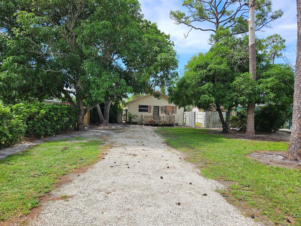 Photo of 409 Perry Avenue, Greenacres, FL 33463 (MLS # R11131937)