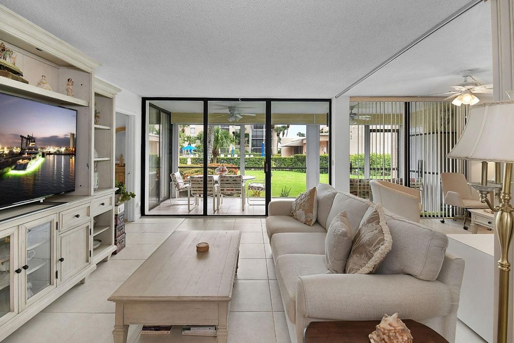 Photo of 3412 NE Causeway Boulevard #103, Jensen Beach, FL 34957 (MLS # F10525666)