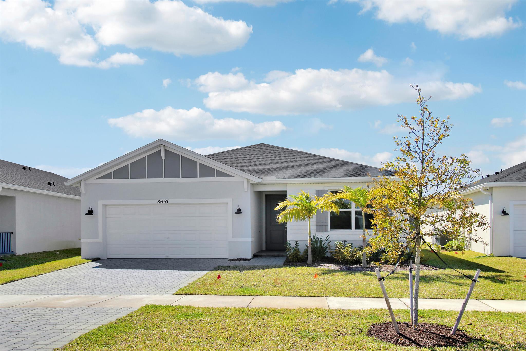 New Construction Smart Home - 4BR/3BA in Beautiful Gated Community Azalea!Built in 2024, this 4-bedroom, 3-bathroom smart home offers nearly 2,200 sq. ft. of modern living space with an open floor plan, high ceilings, and hurricane impact windows. Equipped with top-of-the-line smart appliances, including a smart washer and dryer, EV charger, this home offers the latest in convenience and technology. Enjoy a lake view and plenty of natural light throughout. Located in a gated community of just 99 homes with low HOA fees covering landscaping. Conveniently near I-95, shopping, and dining. Move-in ready
