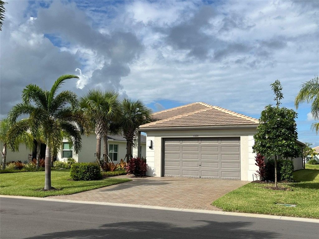 Photo of 11626 Moon River Way, Port Saint Lucie, FL 34987 (MLS # F10465001)