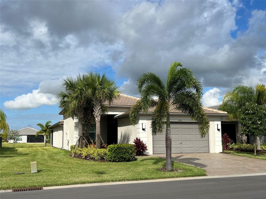Photo of 11626 Moon River Way, Port Saint Lucie, FL 34987 (MLS # F10465001)