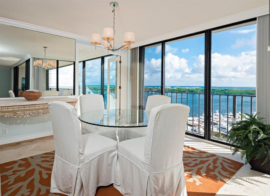 Gorgeous marina, intracoastal, and ocean views from this beautifully remodeled unit on the tower floor of Quay South. The list of upgrades includes: Marble floors throughout, crown molding, custom cabinet style Sub-Zero refrigerator, Fisher and Paykel dishwasher, granite counter tops, washer and dryer in unit, to name a few. You will not be disappointed by this light and bright condo located directly on the Intracoastal Waterway with shopping and dining right outside your door.