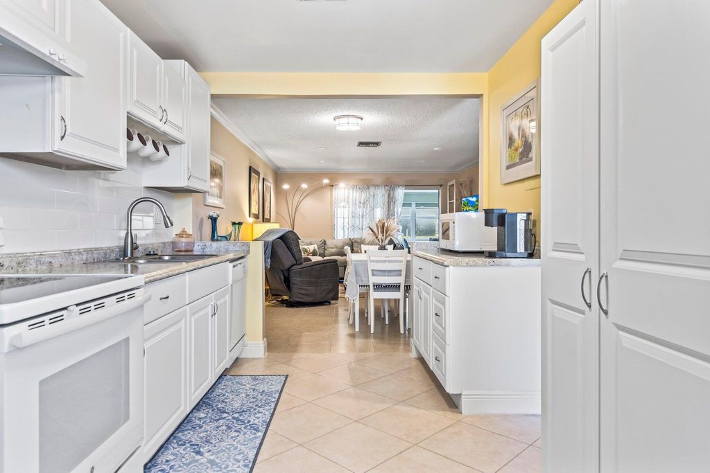 Photo of 2886 Fernley Drive E #77, West Palm Beach, FL 33415 (MLS # R10978828)