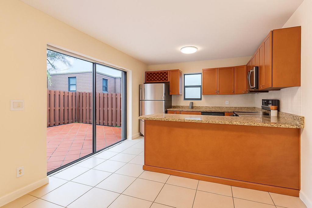 Photo of 7575 W Courtyard Run Run W, Boca Raton, FL 33433 (MLS # B26035104)