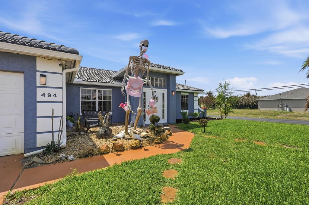 Photo of 494 SW Paar Drive, Port Saint Lucie, FL 34953 (MLS # B26008353)