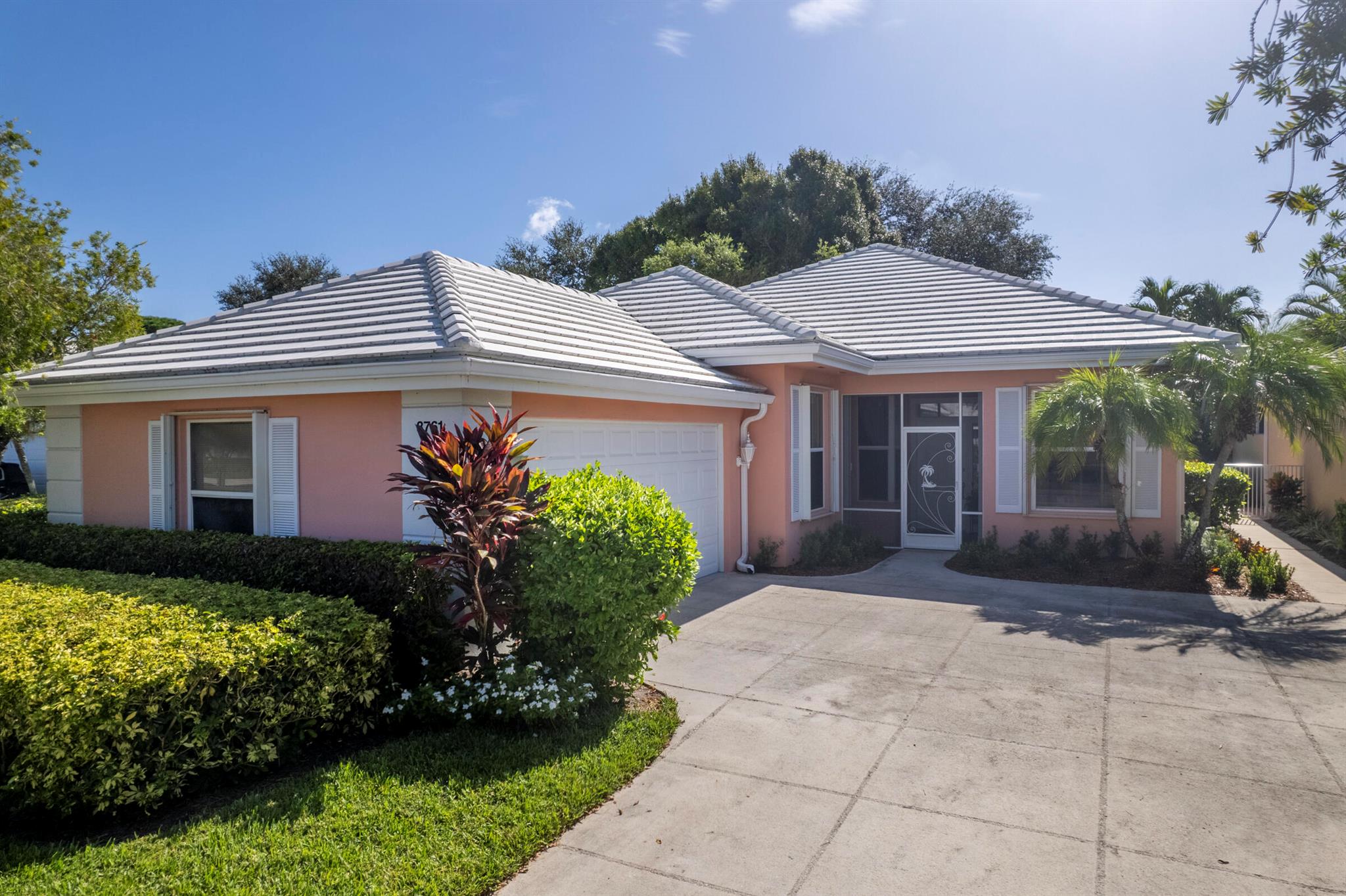 Welcome to a pristine, move-in ready gem in Garden Oaks. This 3BR/2BA and 2-car garage home blends sophistication and comfort with its open floor plan, sunlit interiors and serene garden view. Where every detail has been thoughtfully renovated, it features updated piping, full impact windows/doors or shutters, a tasteful neutral palette, and elegant kitchen. The screened patio and private yard invite you to relax or entertain. Showing like a model home and surrounded by an exceptional DiVosta community of oak-lined streets, lakes, desirable amenities- security, gated, community pool and tennis/pickleball, this opportunity offers the refined lifestyle discerning buyers seek.This home allows you to simply unpack and start living the refined Palm Beach Gardens lifestyle!